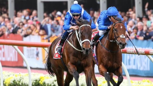 Winx and Hugh Bowman combine to win the Cox Plate at Moonee Valley.