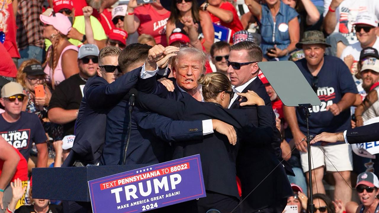 Comperatore scrambled to protect his family in the line of fire as bullets whizzed past former president Trump. Picture: Rebecca Droke / AFP