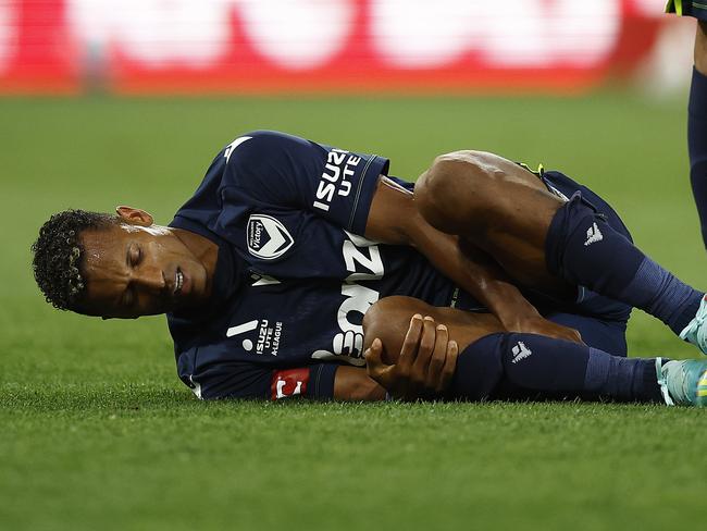 Nani clutches his knee after suffering an injury while playing against Brisbane Roar. Picture: Daniel Pockett / Getty Images