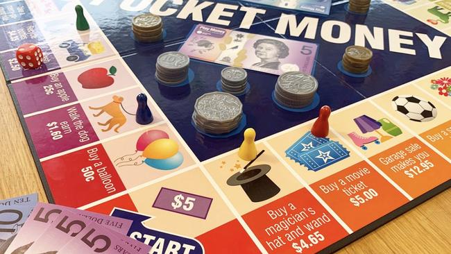 The Pocket Money board game introduces young players to cash and spending.