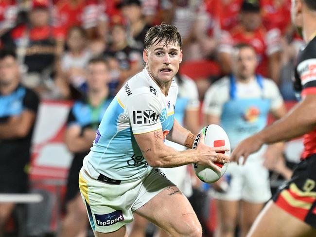 BRISBANE, AUSTRALIA - FEBRUARY 22: AJ Brimson of the Titans looks to pass during the 2025 NRL Pre-Season Challenge match between Dolphins and Gold Coast Titans at Kayo Stadium on February 22, 2025 in Brisbane, Australia. (Photo by Bradley Kanaris/Getty Images)