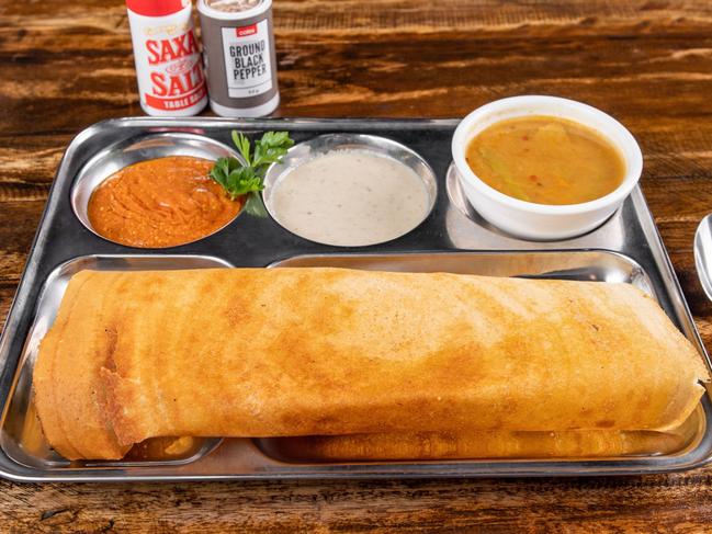 The ghee masala dosa is a traditional Indian breakfast snack.