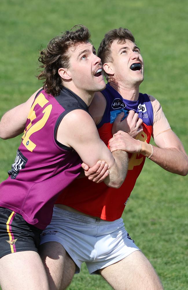 Jack McKay (right), of Fitzroy, battles with Austin Bradtke of Old Haileybury. Picture : George Salpigtidis