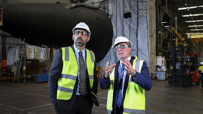 ASC chief executive officer Stuart Whiley in 2017 with former AFL footballer Adam Goodes, in his capacity as director of the Indigenous Defence Consortium. Picture Sarah Reed