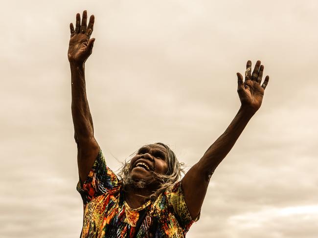 Mrs Norris at Kaljtiti, SA during a ceremony welcoming her on to country, and mourning the Stolen Generation with a dance about a wallaby. Picture: Julian Kingma