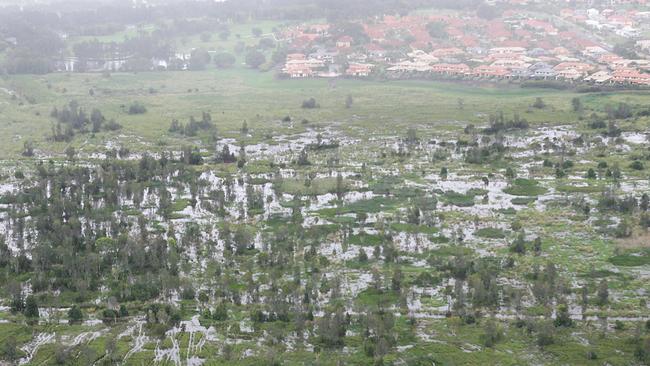 The proposed Breakwater development on the Robina-Merrimac floodplain has residents concerned of the risks if further floods, such as these in 2008, occur.