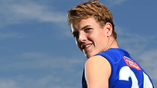 MELBOURNE, AUSTRALIA - DECEMBER 15: Tom Powell of the Kangaroos poses during a North Melbourne Kangaroos AFL training and media session at Arden Street Ground on December 15, 2020 in Melbourne, Australia. (Photo by Quinn Rooney/Getty Images)