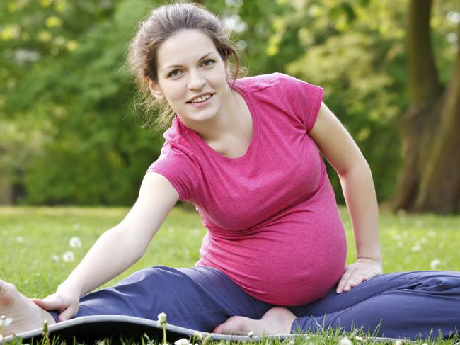 Generic photo of a pregnant woman exercising. Picture: iStock