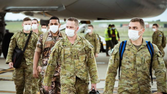 Australian Defence Force troops disembarking at Avalon Airport last week. Picture: Darrian Traynor/Getty Images