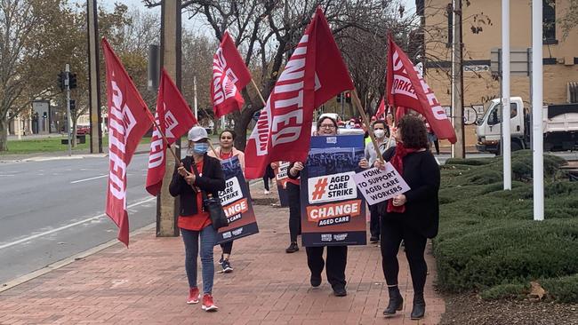 Striking aged care workers march in Adelaide. Picture: Kitty Barr