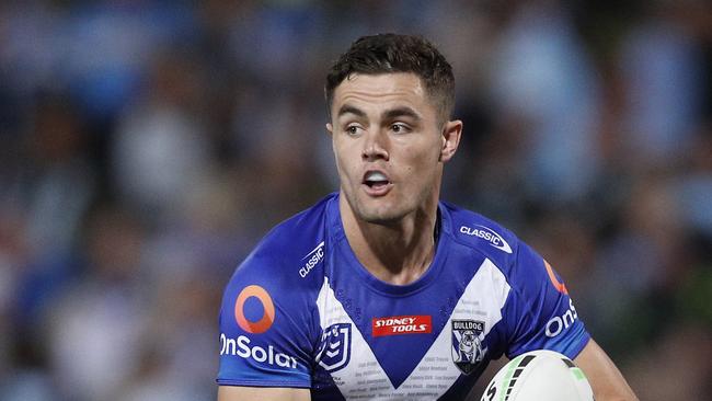 SYDNEY, AUSTRALIA - APRIL 24: Kyle Flanagan of the Bulldogs runs the ball during the round seven NRL match between the Cronulla Sharks and the Canterbury Bulldogs at Netstrata Jubilee Stadium, on April 24, 2021 in Sydney, Australia. (Photo by Jason McCawley/Getty Images)