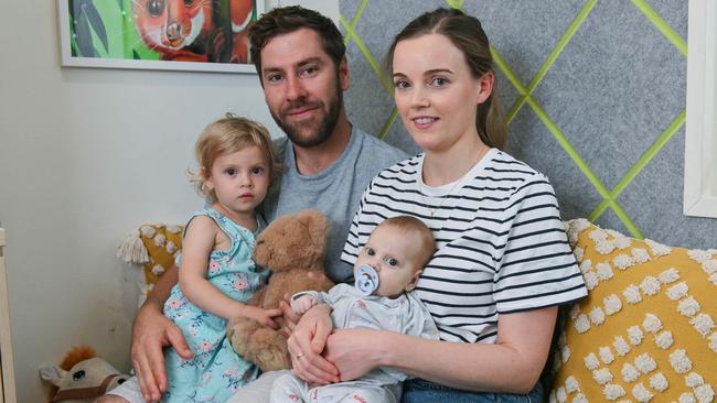 Baby Hugh Leech with parents James Leech and Tenille McDonald and big sister Maya at Ronald McDonald House. Picture: Brenton Edwards