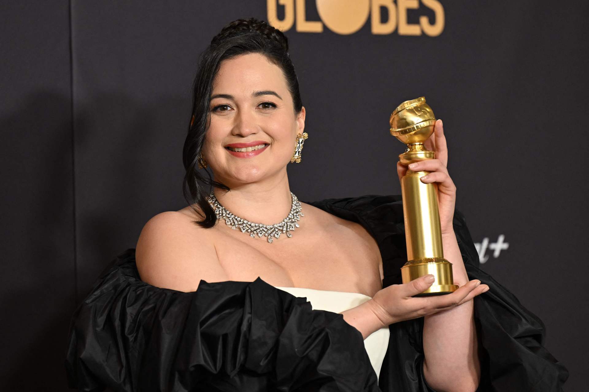 <p><em>Image credit: AFP</em></p><h3>Lily Gladstone in Bulgari</h3><p>Gladstone was the first Indigenous recipient of a Golden Globe for Best Actress in the awards&rsquo; history. For the event, Gladstone wore a diamond-set necklace from Bulgari, featuring a dazzling array of over 70 diamonds. To compliment the necklace, Gladstone opted for earrings from Antelope Woman Designs, designed by Lenise Omeasoo&mdash;a Blackfeet and Cree beadwork artist based in Arlee, a small town in Gladstone&rsquo;s home state of Montana. The beaded earrings resembled a picture frame, with a black-and-white parfleche design in the interior. Gladstone made other references to her ancestry on the night, opening her acceptance speech in Blackfeet language.</p>