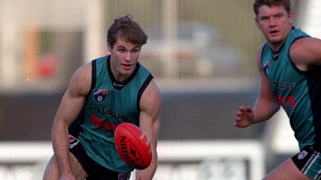 Tom Harley at Port Adelaide training with Scott Cummings, right, in 1998.