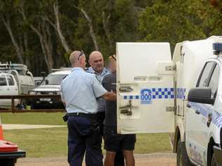 CAUGHT: The man who allegedly fled from police is taken into custody. Picture: Caitlan Charles