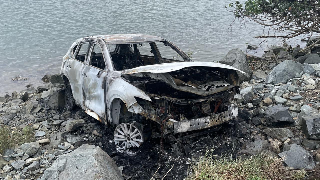 Police are investigating following a car fire by the Pioneer River just before 12.30pm. Photo: Fergus Gregg