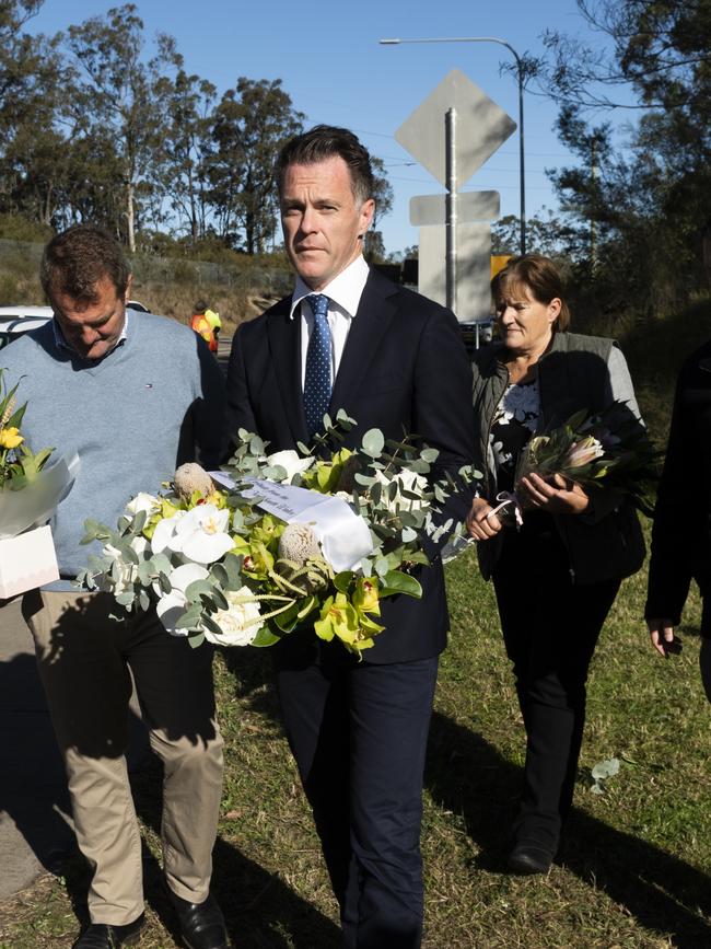 NSW Premier Chris Minns lays a wreath at the public memorial of the Greta bus crash days after it happened .Picture: NCA NewsWire / Rhett Wyman pool