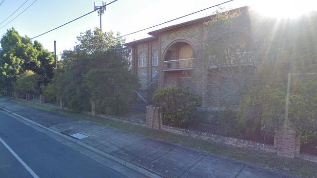 Smoke was billowing out across the Pacific Motorway this morning after a fire broken out on the second level of the former Antiques and Collectables Market building at Loganholme. Picture: Contributed