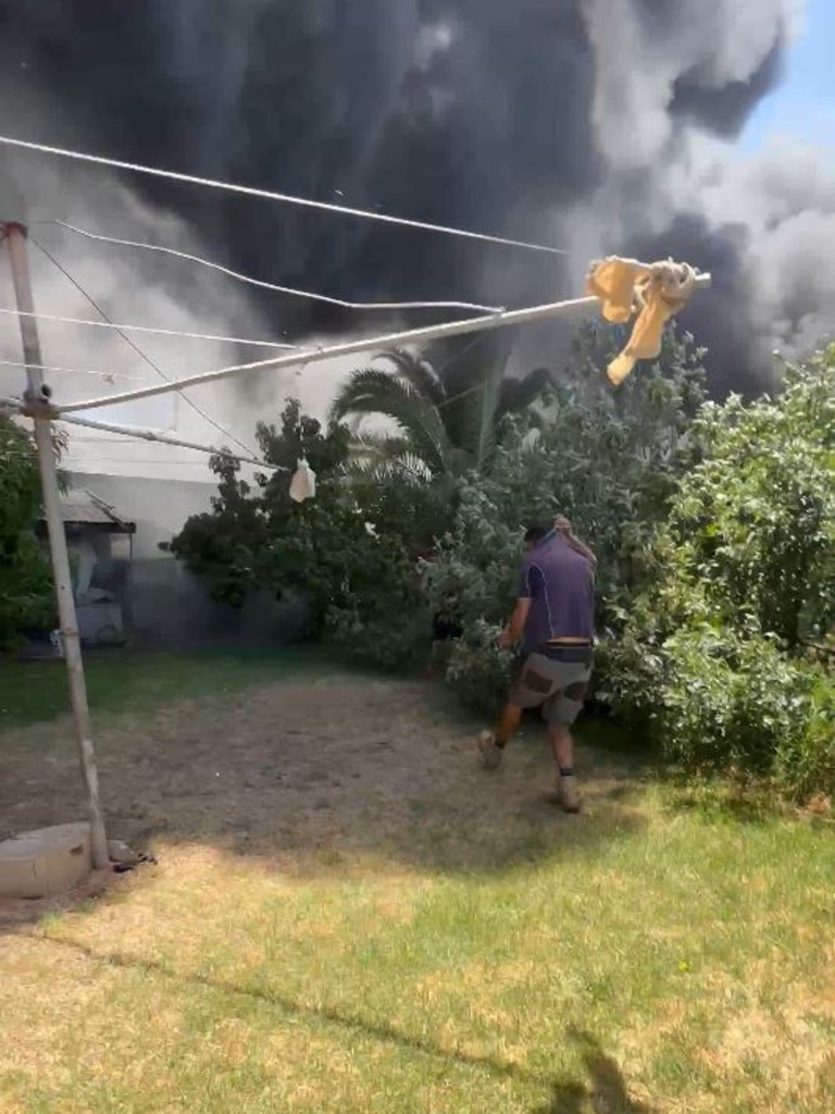 Seaton house fire where an elderly woman was rescued by some tradies . Picture: 7NEWS