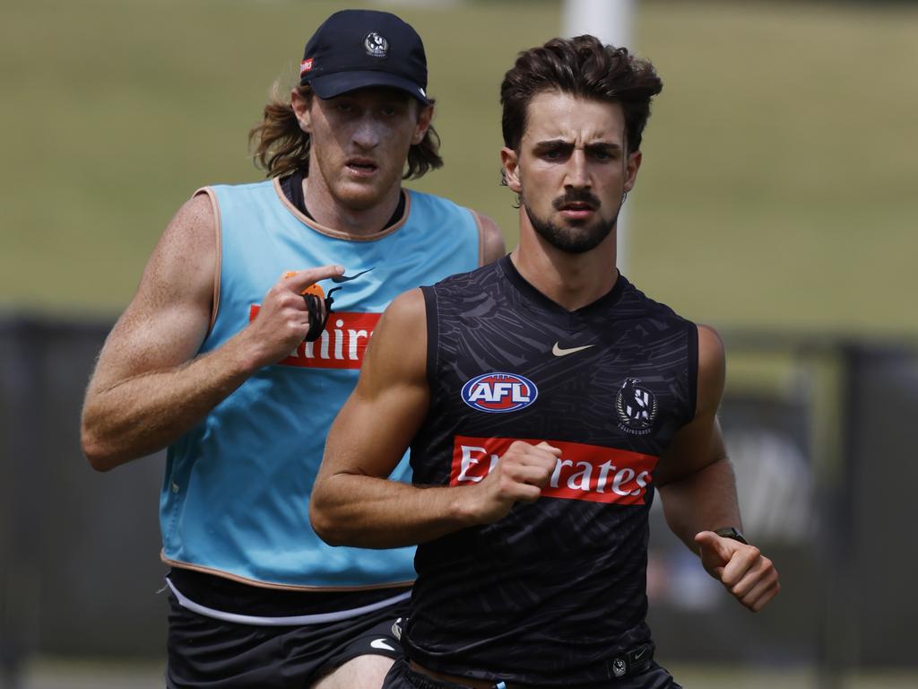 Josh Daicos and Nathan Murphy are two of the very few Pies who aren’t in full training. Picture: Michael Klein