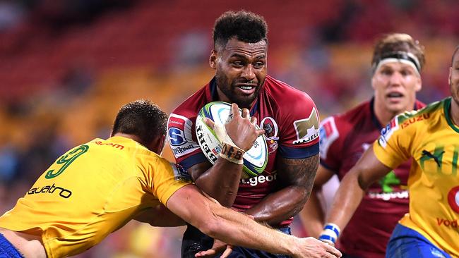 BRISBANE, AUSTRALIA - MARCH 10:  Samu Kerevi of the Reds attempts to break through the defence during the round four Super Rugby match between the Reds and the Bulls at Suncorp Stadium on March 10, 2018 in Brisbane, Australia.  (Photo by Bradley Kanaris/Getty Images)