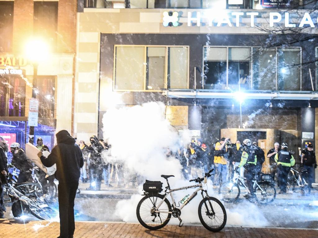 Police and protesters on Saturday night. Picture” Stephanie Keith/Getty Images/AFP