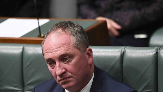 Australian Deputy Prime Minister Barnaby Joyce attends a statement on the Royal Commission into Institutional Responses to Child Sexual Abuse in the House of Representatives at Parliament House in Canberra, Thursday, February 8, 2018.  (AAP Image/Lukas Coch) NO ARCHIVING