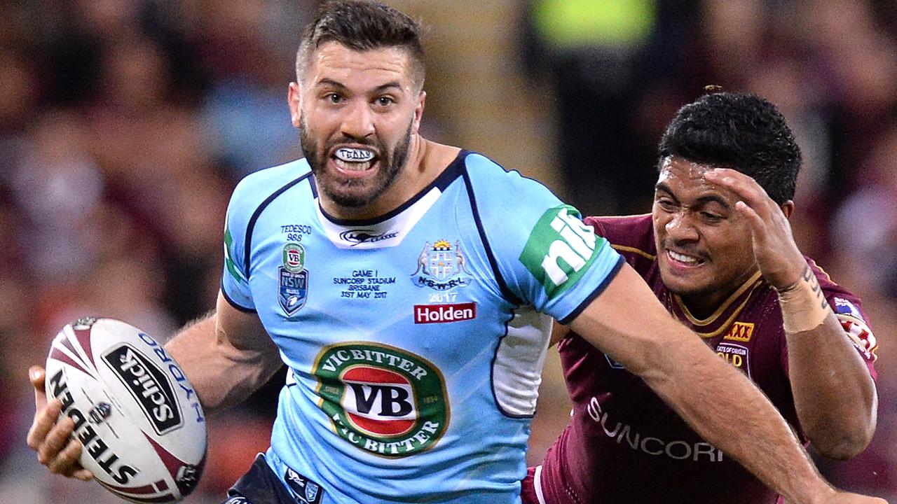 James Tedesco attempts to evade Anthony Milford in Origin I last year.