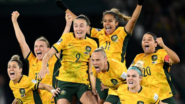 BRISBANE, AUSTRALIA - AUGUST 12: Australia players celebrate as Eve Perisset of France misses her team's fifth penalty in the penalty shoot out during the FIFA Women's World Cup Australia & New Zealand 2023 Quarter Final match between Australia and France at Brisbane Stadium on August 12, 2023 in Brisbane, Australia. (Photo by Quinn Rooney/Getty Images )