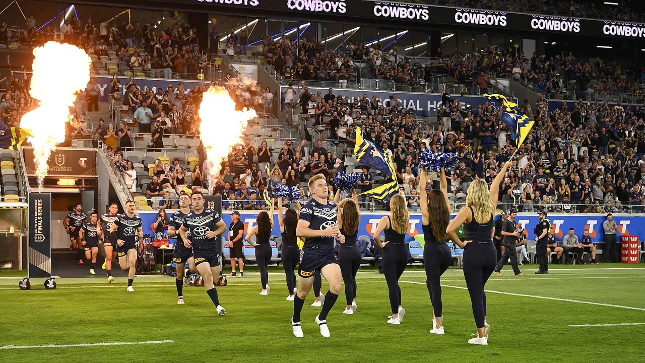 The North Queensland Cowboys take the field against the Newcastle Knights at Queensland Country Bank Stadium in Townsville on Saturday. Picture: Ian Hitchcock-Getty Images