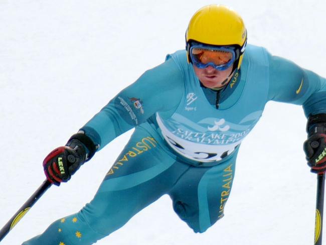 Paralympic skier Michael Milton of Australia on his way to winning LW2 division of men's super-G race at 2002 Salt Lake Winter Paralympics at Snowbasin, Utah.