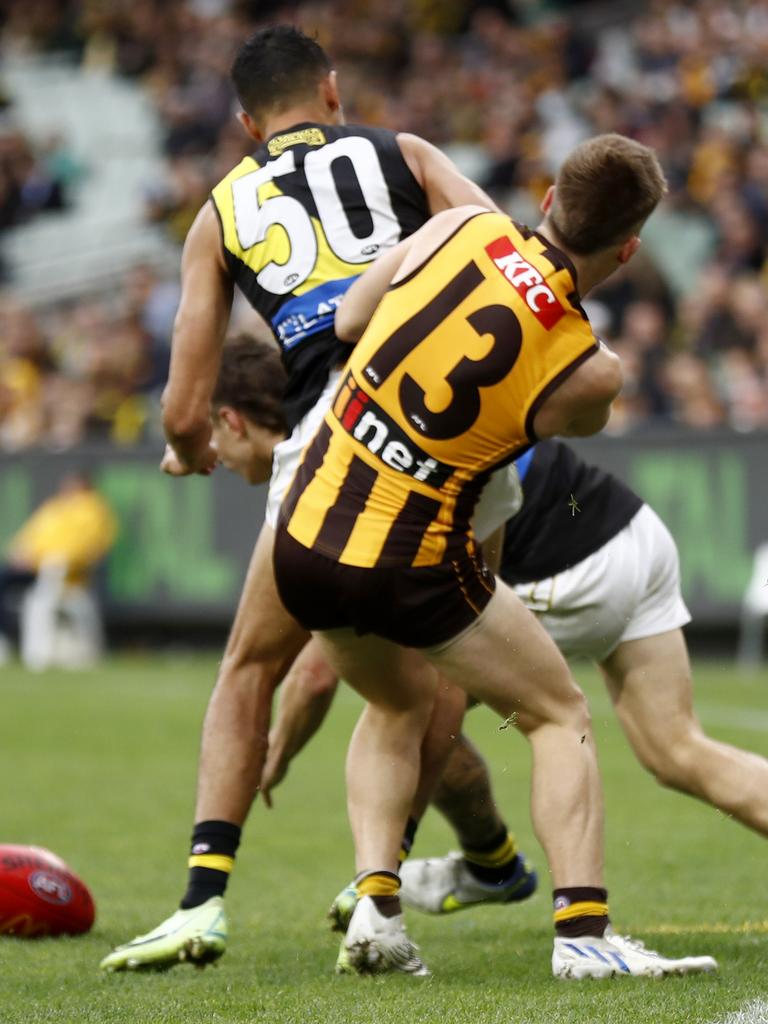 Marlion Pickett’s bump on Hawk Dylan Moore. Picture: Darrian Traynor/AFL Photos
