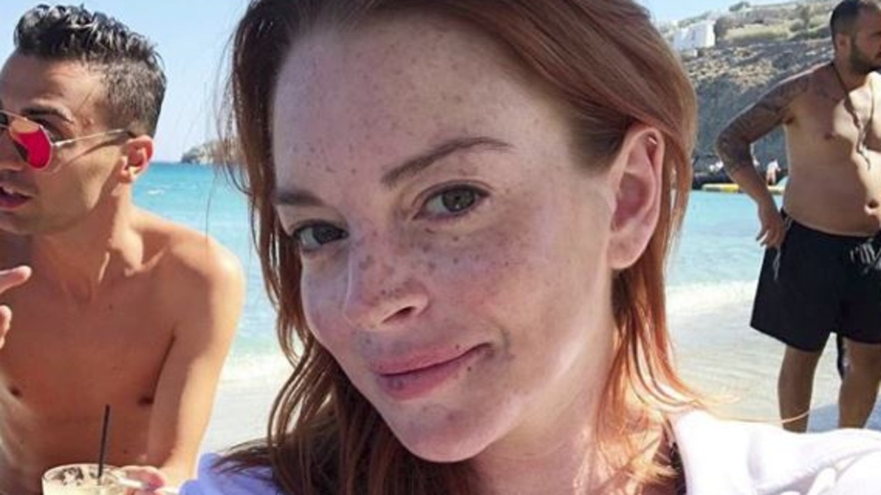 Lohan hits the beach in Mykonos.