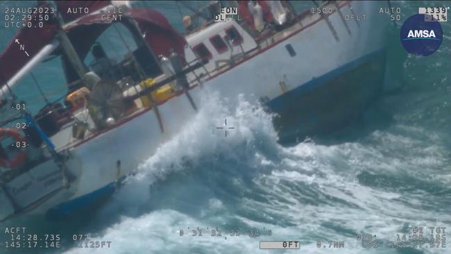 Two men have been rescued after their sailing vessel ran on to a reef near Lizard Island on Thursday August 24. Picture: AMSA