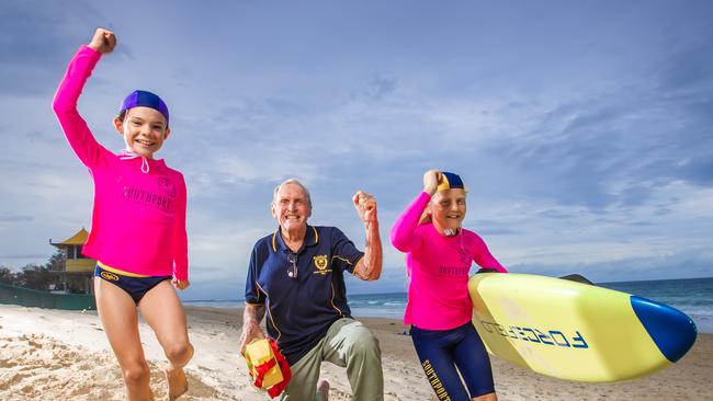 Southport Surf Club life member John Ogilvie with nippers Imogen Coman, 10 and Dean Olsen, 11 ahead of the club's 100-year anniversary celebrations this weekend. Picture: Nigel Hallett