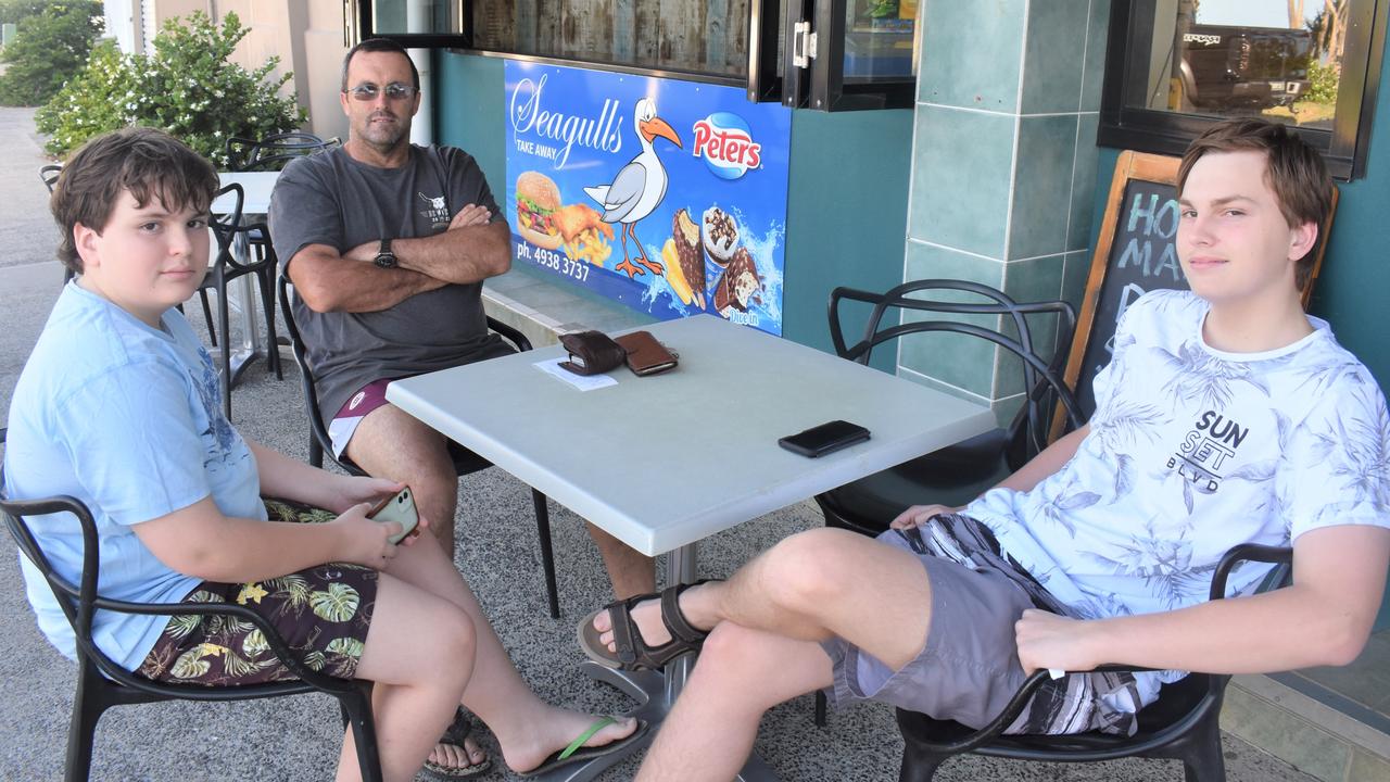 Andrew Campbell with Matthew and Braydon, The Caves, waiting for some fish and chips at Yeppoon Foreshore.