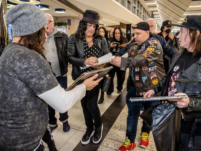 Paul Stanley signs autographs for fans upon arrival at Melbourne Airport to begin the Australian leg of the End of the Road Tour. Picture: Jake Nowakowski