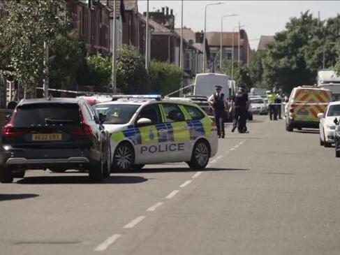 Children killed in 'ferocious' knife attack, UK police say