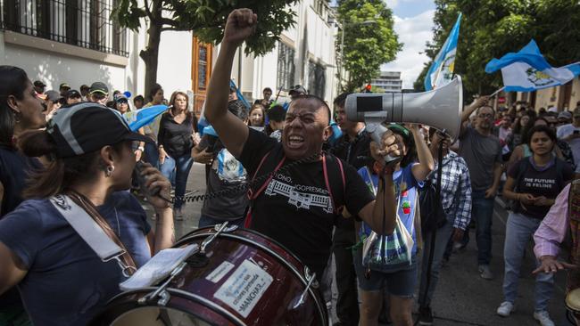 Demonstrators in Guatemala City demand the resignation of President Jimmy Morales yesterday. Picture: AP