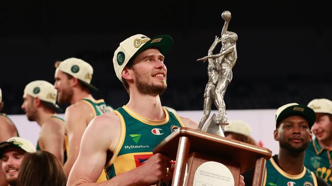 MELBOURNE, AUSTRALIA - MARCH 31: Clint Steindl (c) of the JackJumpers look on with the trophy after JackJumpers win game five of the NBL Championship Grand Final Series between Melbourne United and Tasmania JackJumpers at John Cain Arena, on March 31, 2024, in Melbourne, Australia. (Photo by Kelly Defina/Getty Images)