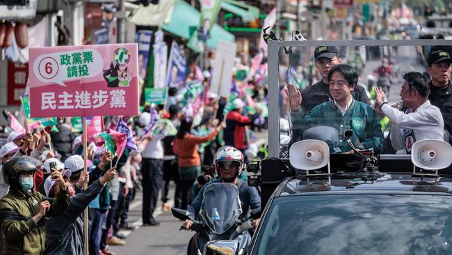 Mr Lai during a campaign motorcade in Kaohsiung earlier this month. Picture: Yasuyoshi Chiba/AFP