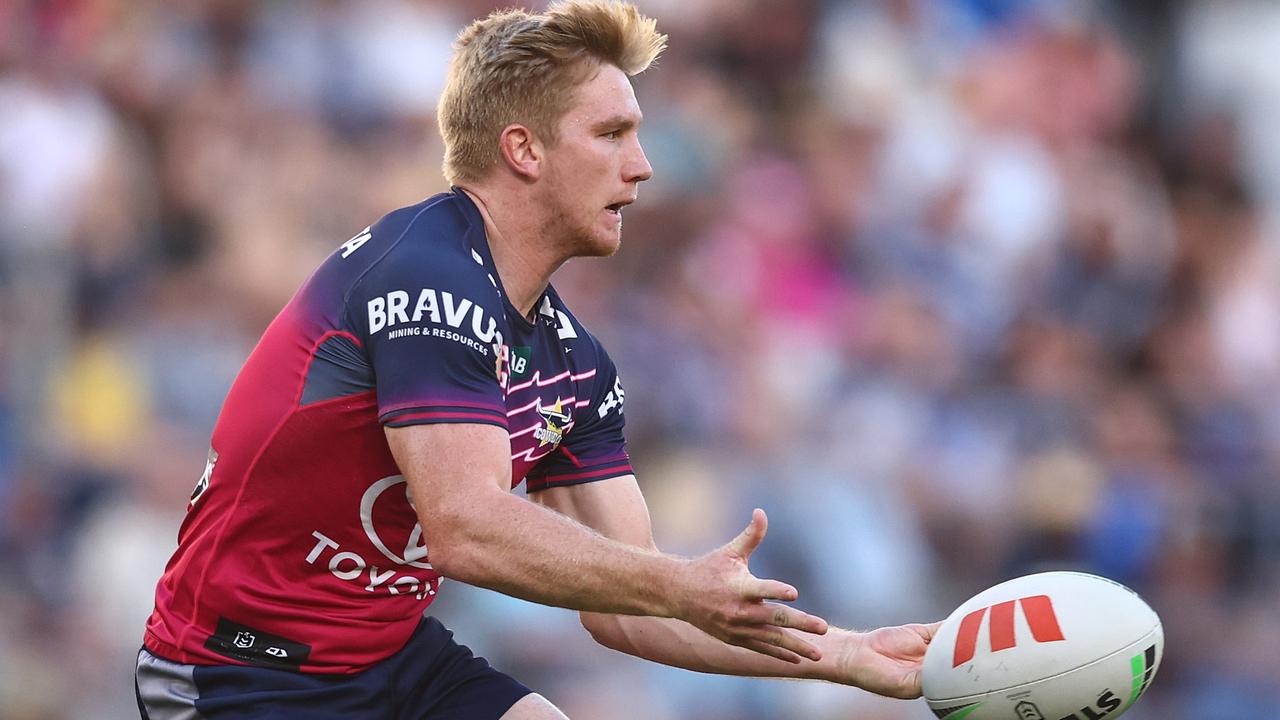 Tom Dearden throws a pass during the round 22 NRL match between Gold Coast Titans and North Queensland Cowboys. (Photo by Chris Hyde/Getty Images)