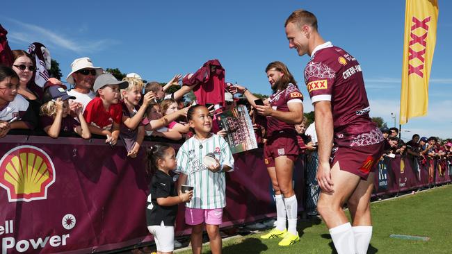 Pat Carrigan and Daly Cherry-Evans with Queensland fans. Picture Lachie Millard