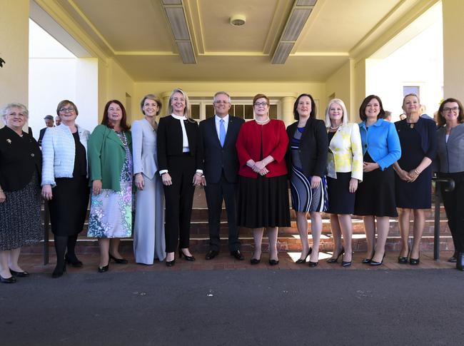 The Australian Prime Minister with the female members of his ministry after the swearing-in. Picture: AAP/Lukas Coch