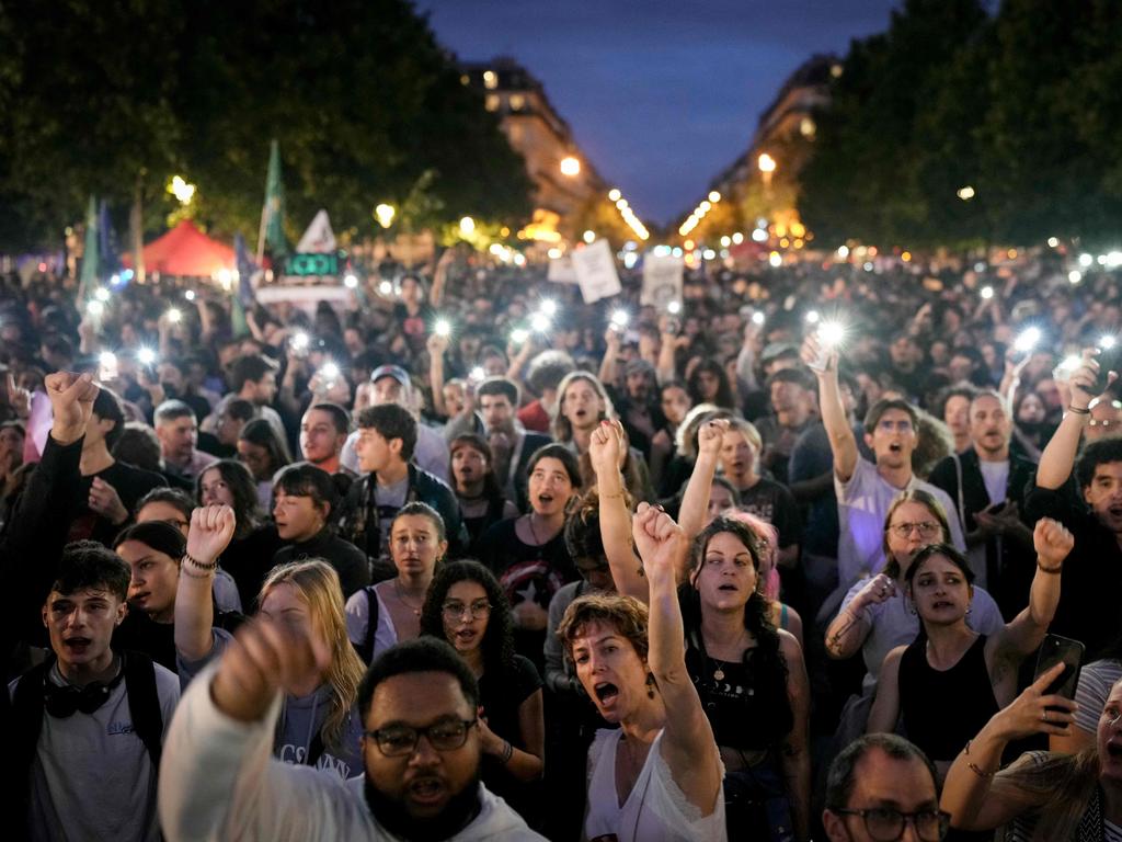 Demonstrators take part in a rally after the announcement of the results of the first round of French parliamentary elections, at Place de la Republique in Paris on June 30, 2024. France’s far right won the first round of pivotal legislative elections on June 30, 2024, with the centrist forces of France’s President coming in only third behind the left after the highest turnout in over four decades, estimates said. Picture: AFP