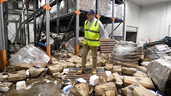 Former Prime Minister Scott Morrison visited the ruined Norco Ice Cream factory, a week after declaring a national emergency. Picture: Dave Hunt