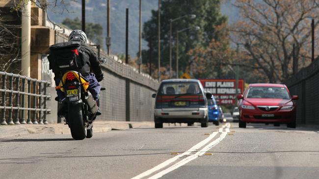 Traffic on Victoria Bridge over the Nepean River at Penrith, where motorists pay higher premiums than their Emu Plains counterparts.