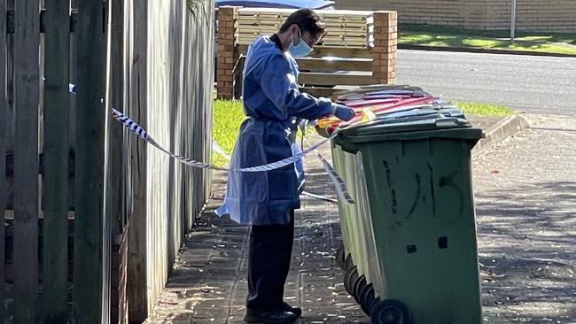 Forensic police investigating the scene of an alleged attack in Labrador. Picture: Charlton Hart