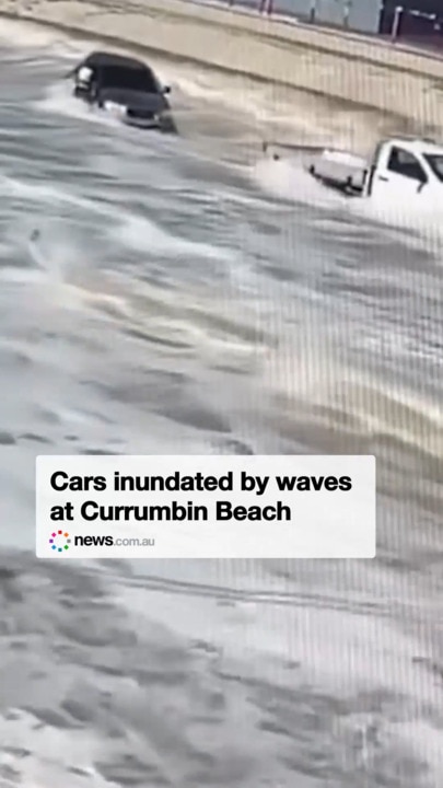 Cars inundated by waves at Currumbin Beach