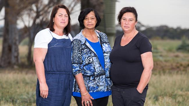 <s1>Emily Pickett (centre) with her daughters Maria-Jane Pickett (left) and Kathleen Miller at the site of the home which burnt down.</s1> Picture: Sarah Matray